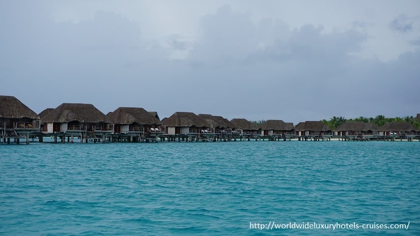 Four Seasons Resort Bora Bora overwater bungalow snorkel room bath bed Tahiti Society Islands Luxury Travel Virtuoso Izumi Ogawa Trip agent vacation advisor Vision French Polynesia Cruise ship boat ocean water sand beach